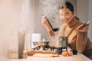 woman-cooking-kitchen_1303-12919